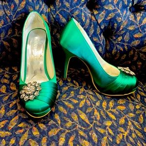 Emerald Green silk with a 4” heel. Size 7
